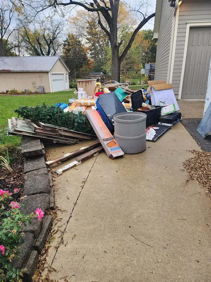 Dumpster being loaded with debris for 3 Yard Dumpster Rental in West York